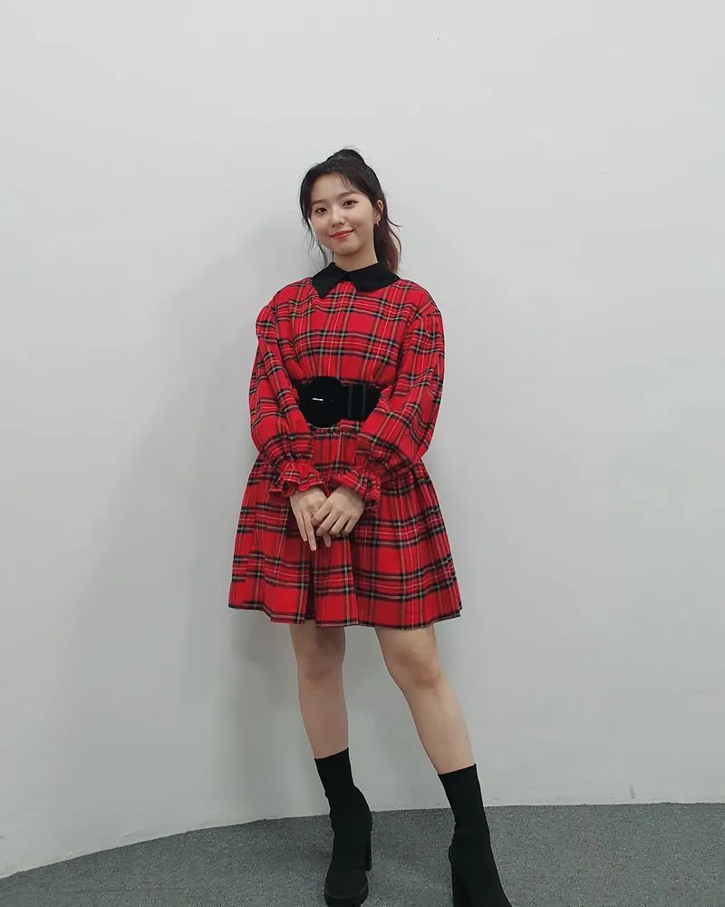 Stella Jang wearing a Royal Stewart tartan dress